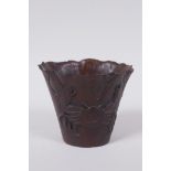 An antique Chinese carved bamboo libation cup of lotus flower form with crab decoration, 8cm high