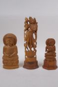 An Indian boxwood carving of a dancer and another two carved in the form of Buddha, largest 23cm