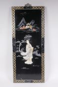 A Chinese black lacquered wood panel with inset mother of pearl, hardstone and bone decoration