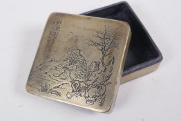 A Japanese white metal ink box, with engraved decoration to the cover depicting fishermen, impressed