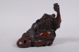 A Chinese carved bamboo root figure of a bearded seated sage, 10cm wide, 10cm high