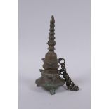 A Tibetan bronze stupa, 18cm high