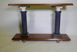 A contemporary hardwood console table, raised on two marble columns, 141 x 36 x 87cm