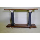 A contemporary hardwood console table, raised on two marble columns, 141 x 36 x 87cm