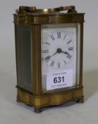 A brass cased glass carriage clock with enamel dial, glass chipped, dial cracked, 12cm high