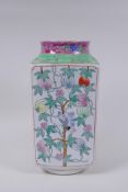 A Chinese famille rose enamelled porcelain square form vase decorated with butterflies and gourds