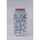 A Chinese famille rose enamelled porcelain square form vase decorated with butterflies and gourds