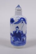 A Chinese blue and white porcelain cylinder scent bottle decorated with figures in a landscape,