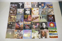 A quantity of vintage vinyl LPs to include Bowie, Elvis Presley, The Beatles, Blondie, Elton John,