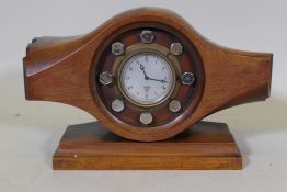 A vintage wood propeller hub, fitted with a Smiths clock, 24cm high, 37cm wide