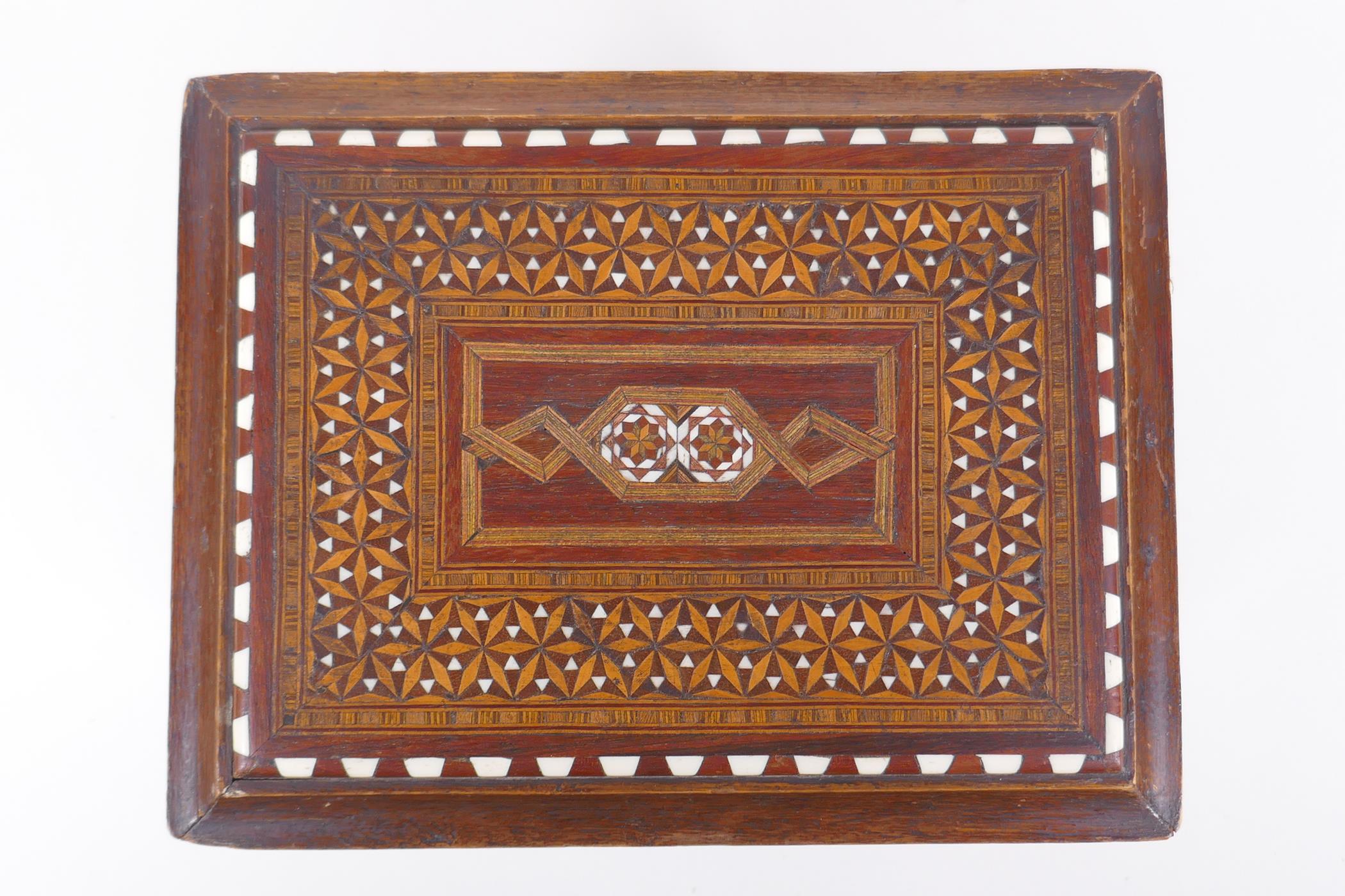 An antique mahogany stand in the form of a table, with sadeli inlaid decoration to top and turned - Image 2 of 3