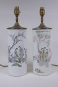 A pair of Chinese Republic porcelain cylinder vases decorated with women of leisure in a garden,