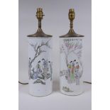 A pair of Chinese Republic porcelain cylinder vases decorated with women of leisure in a garden,