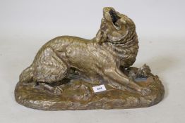 A bronze figure of a dog, in three section, 50 x 29cm high