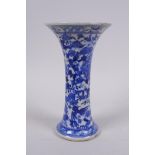 A C19th Chinese blue and white porcelain vase of waisted form, decorated with lotus flowers and