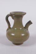 A Chinese miniature tea dust glazed pottery pourer, 6.5cm high