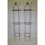 Two wrought iron plant obelisks, 192cm high