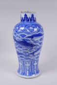 A C19th Chinese blue and white porcelain vase decorated with carp and crabs, Xuande 4 character mark