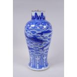 A C19th Chinese blue and white porcelain vase decorated with carp and crabs, Xuande 4 character mark
