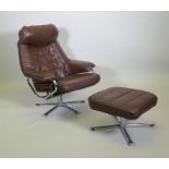 A mid century Norwegian reclining leather armchair and stool by Skoghaug Industries