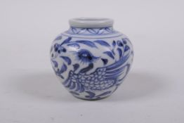An early Chinese miniature blue and white porcelain pot with phoenix decoration, possibly Yuan