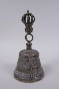 A Sino Tibetan silvered metal ceremonial bell with vajra decoration to handle, 18cm high
