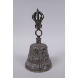 A Sino Tibetan silvered metal ceremonial bell with vajra decoration to handle, 18cm high