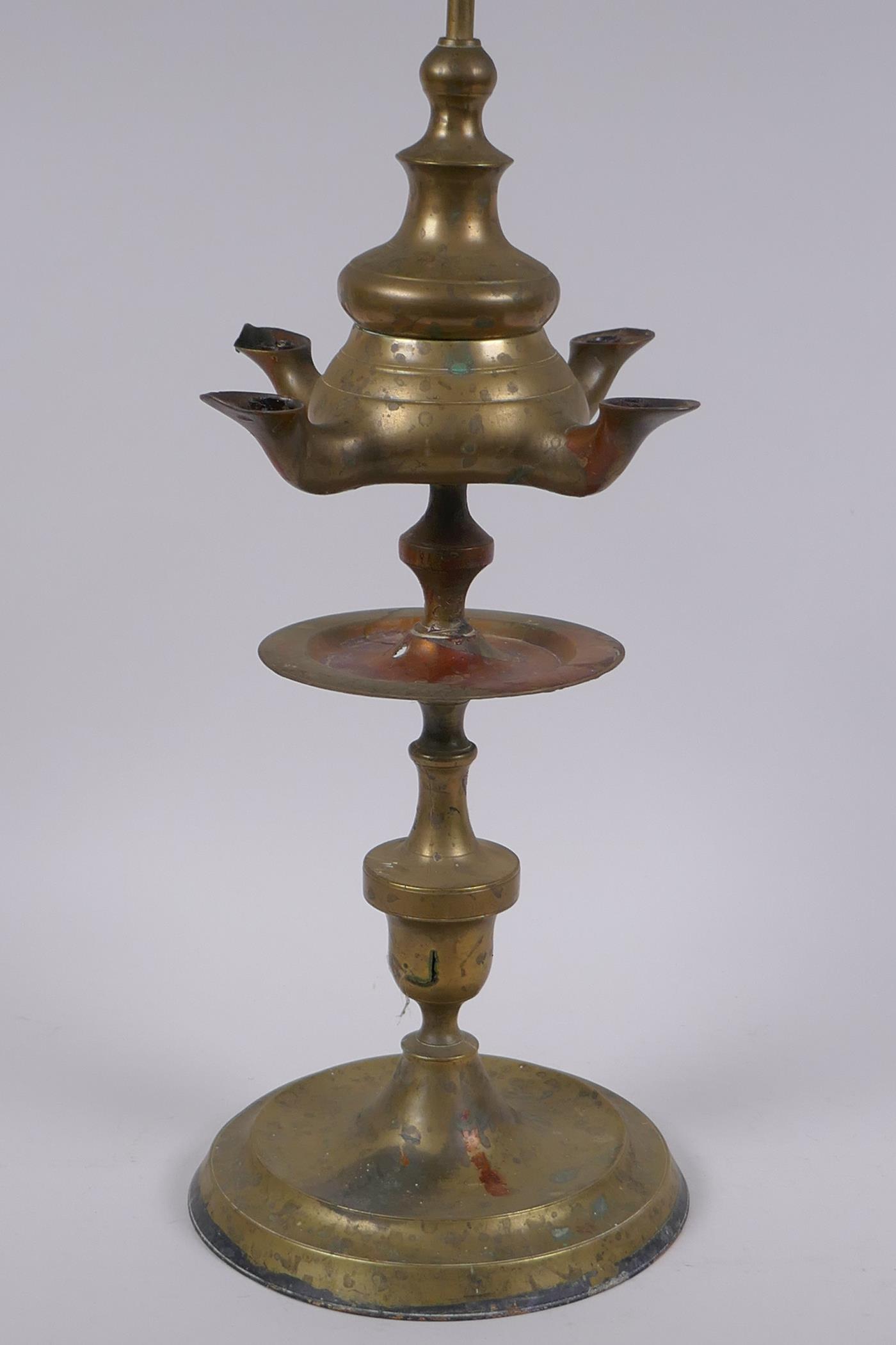 An antique brass four spout whale oil lamp, 65cm high - Image 2 of 4