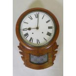 A C19th walnut drop dial wall clock, the movement striking on a bell, with restorations, 52cm x 36cm