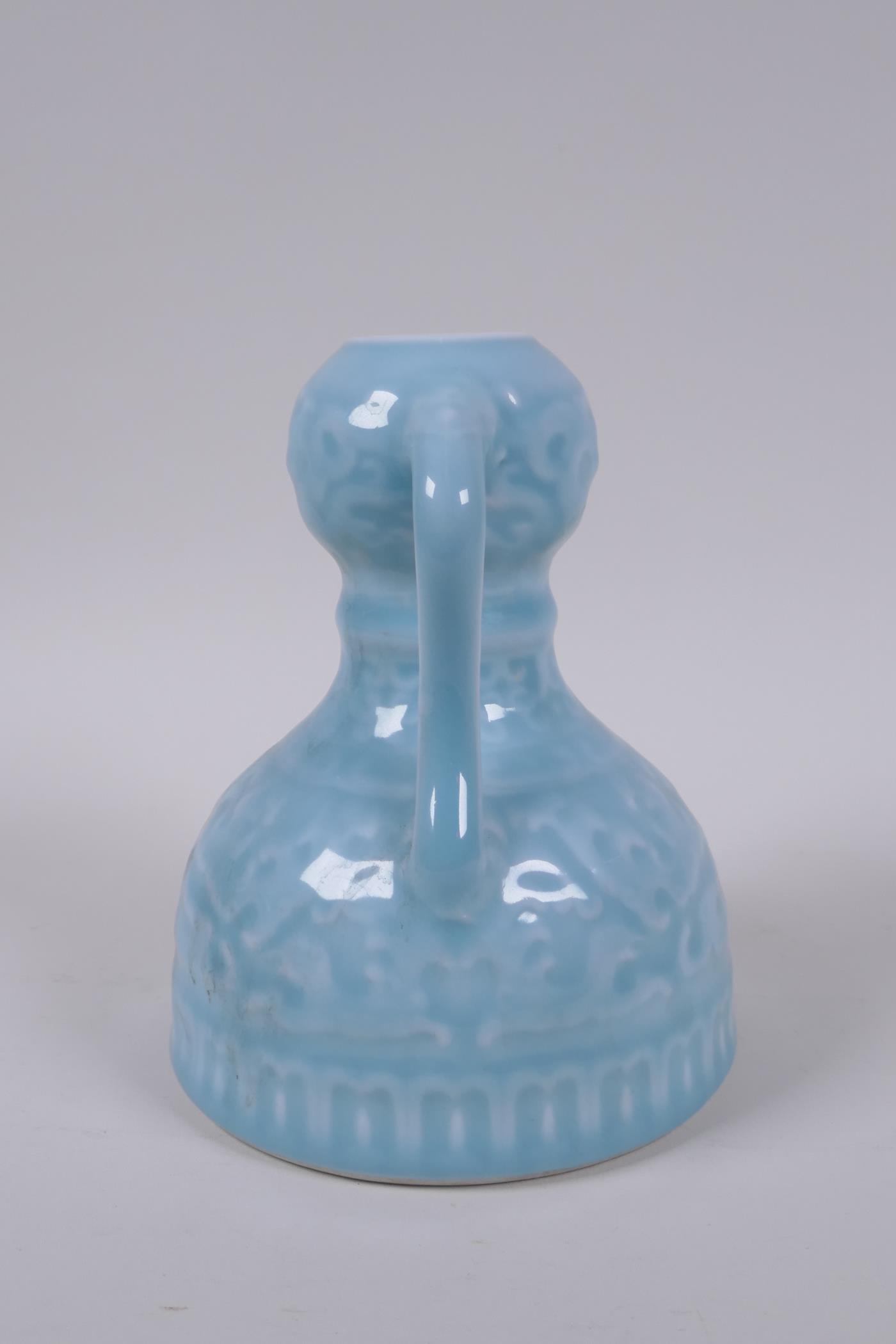 A celadon glazed porcelain two handled garlic head shaped vase with stylised under glaze dragon - Image 4 of 6