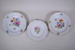 A pair of late C19th/early C20th hand painted Meissen cabinet plates with moulded basket weave rims,