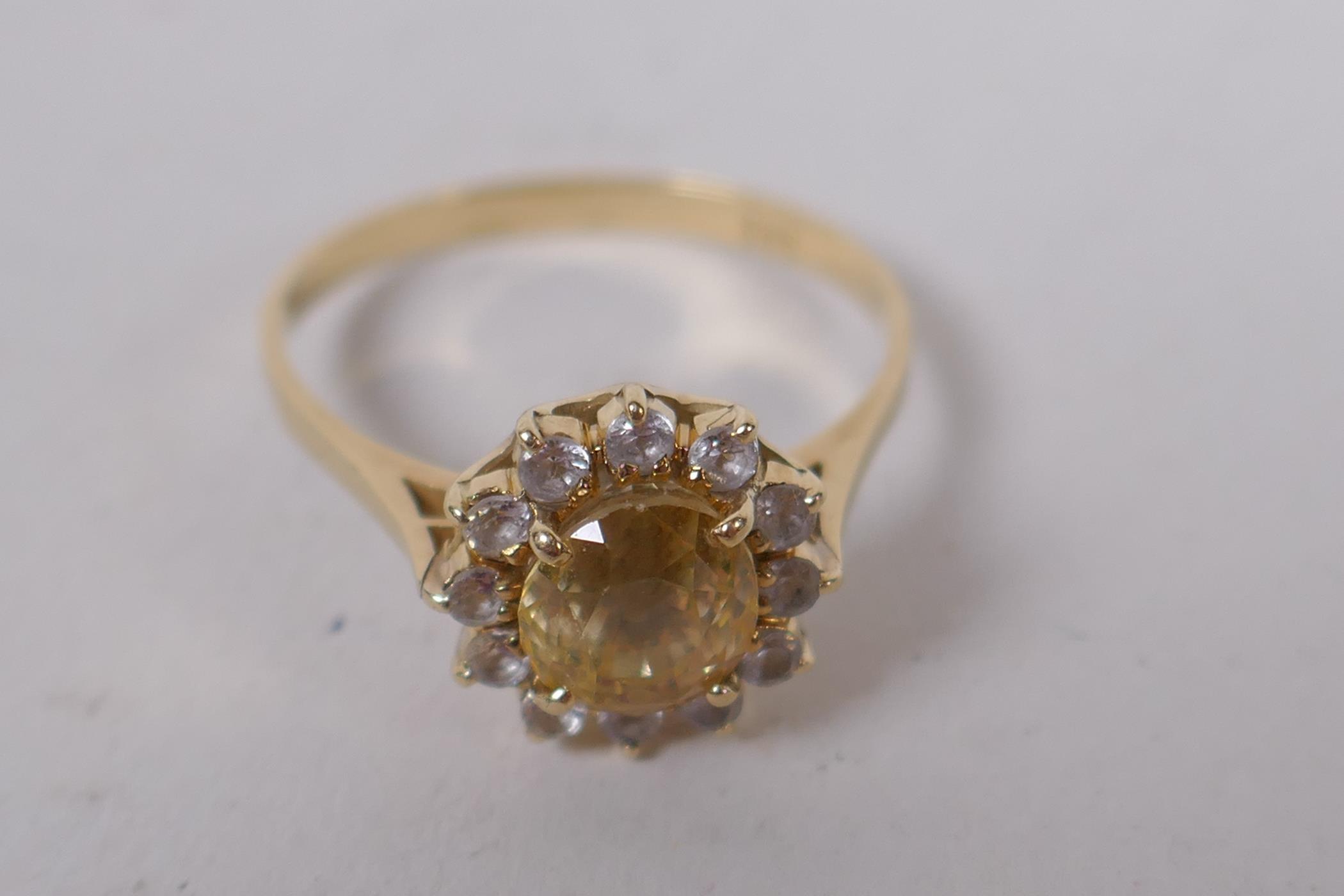 14ct gold ring set with central yellow sapphire surrounded by white sapphires, size N/O - Image 2 of 7