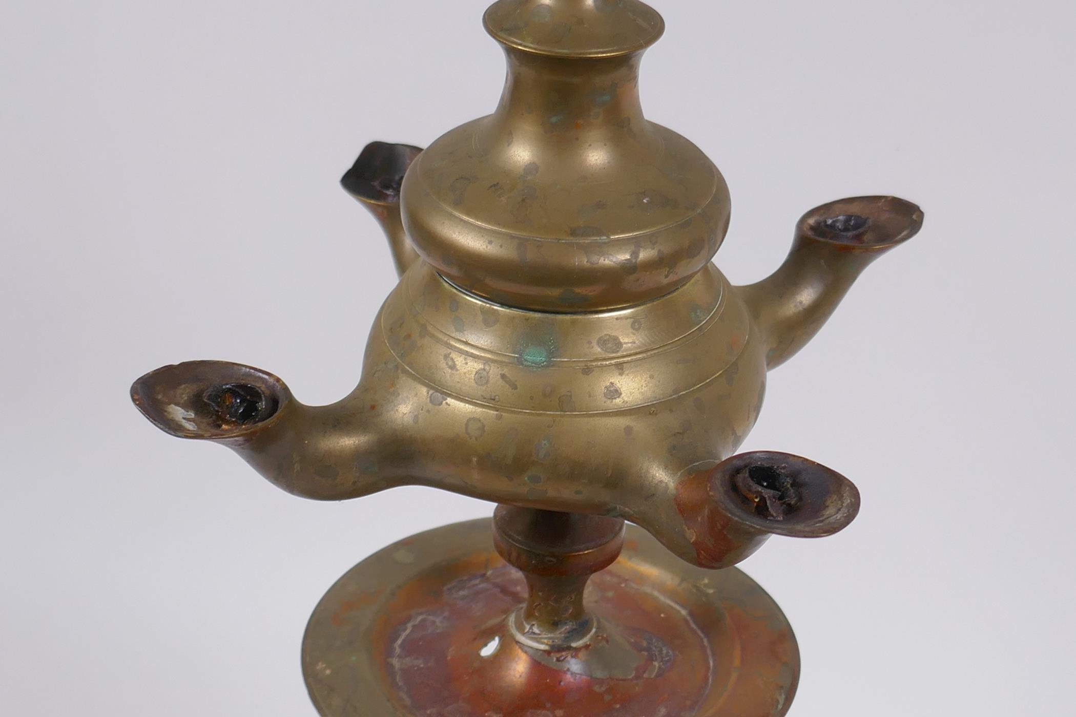 An antique brass four spout whale oil lamp, 65cm high - Image 3 of 4