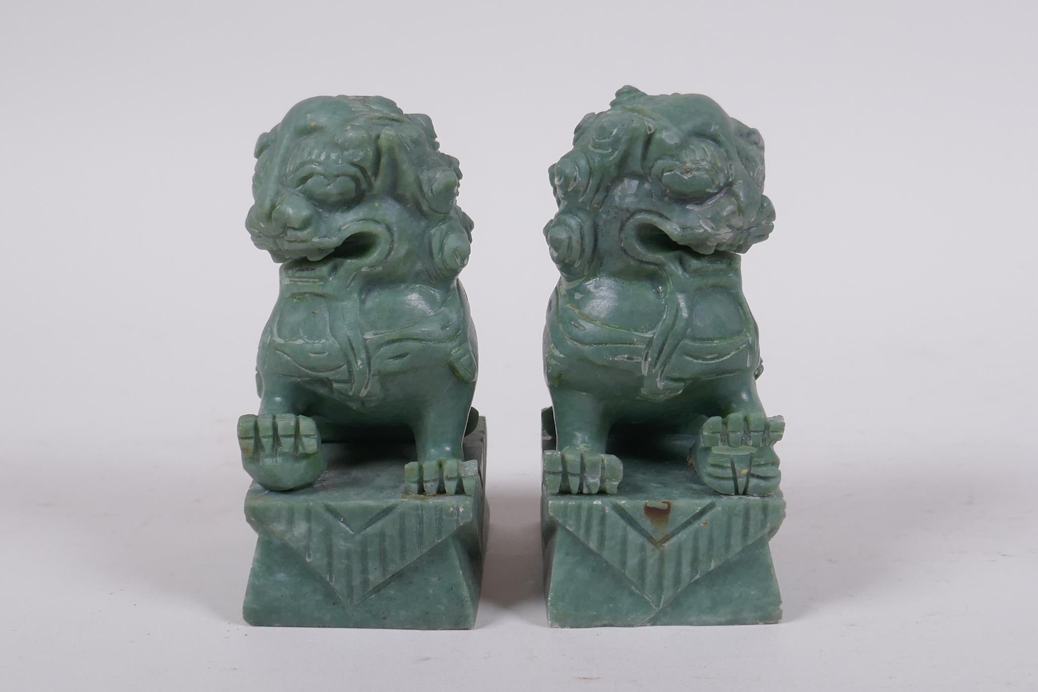 A pair of Chinese carved green soapstone temple lions, 10cm high - Image 5 of 6