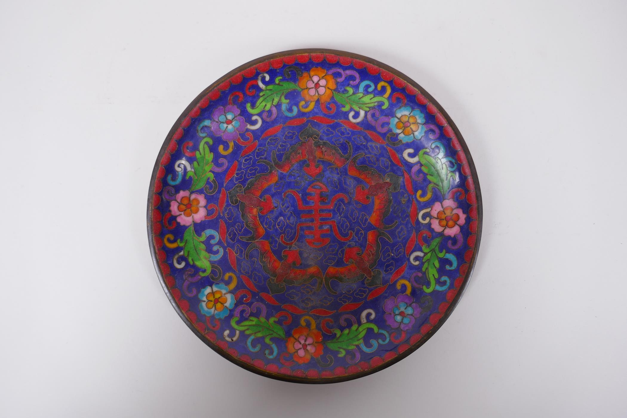 A Chinese cloisonne enamel dish decorated with auspicious symbols, bats and birds, crack to base,
