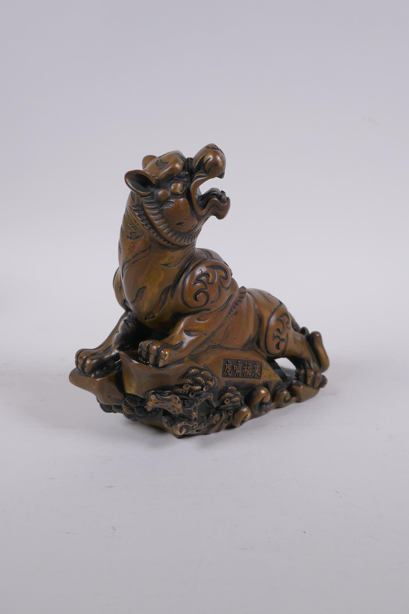 A Chinese bronze figure of a prowling tiger, 4 character inscription to side, impressed Xuande 6 - Image 2 of 7