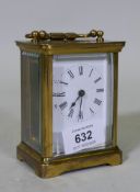 A brass cased glass carriage clock with enamel dial, glass chipped, dial cracked, 12cm high