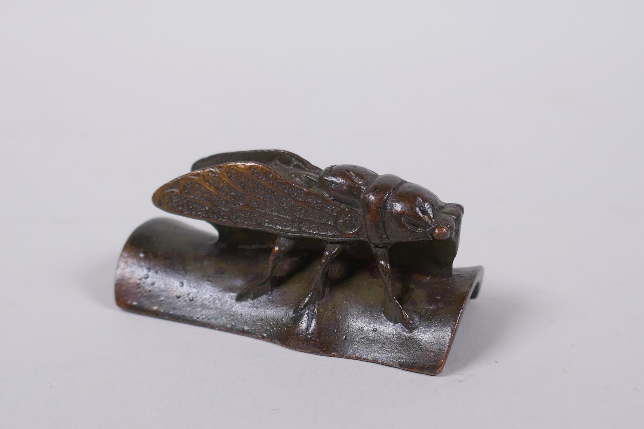 A Japanese bronze okimono cicada on bamboo, signed to base, 6cm - Image 2 of 4