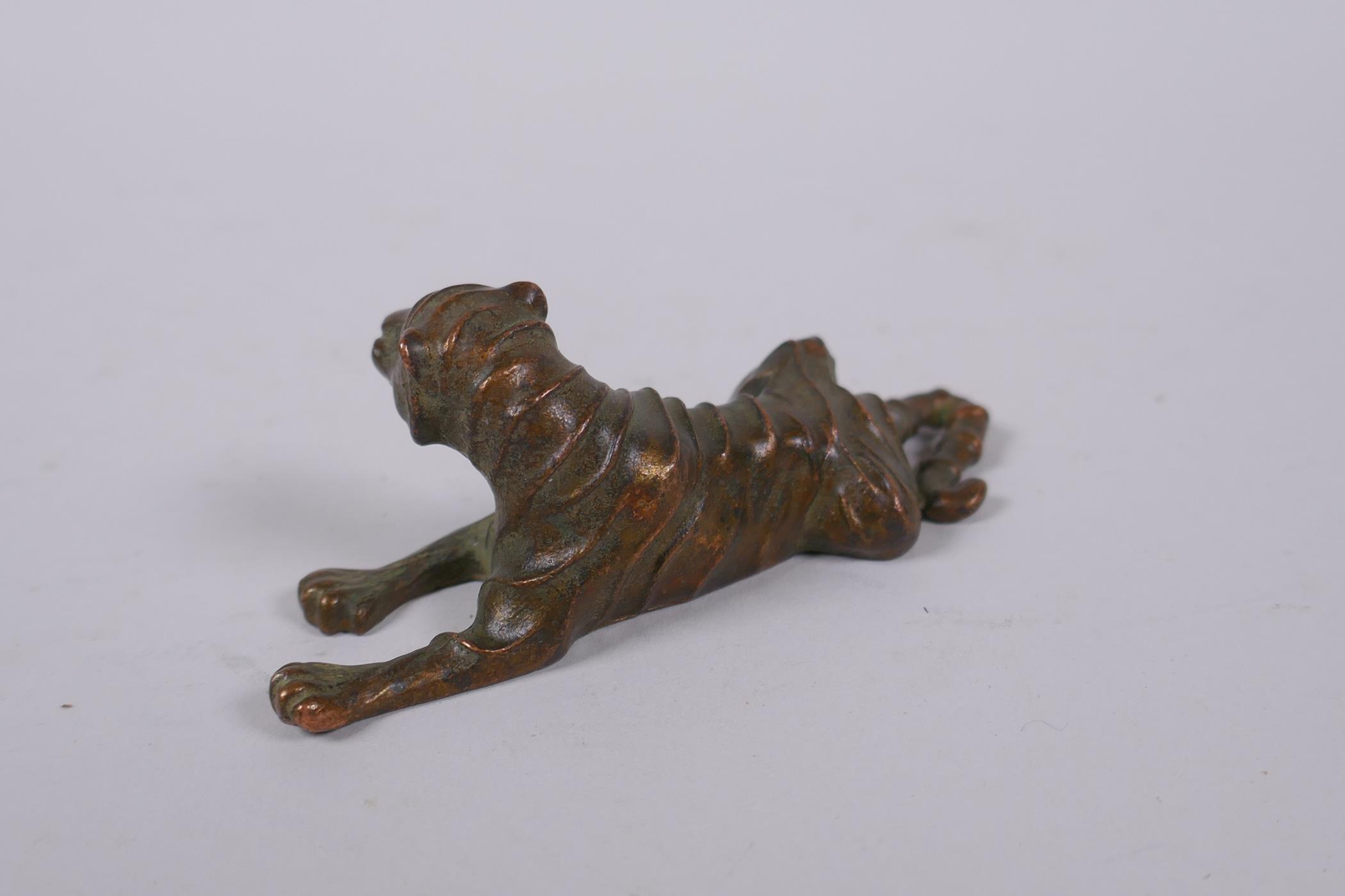 A Japanese bronze okimono tiger, mark to base, 9cm long - Image 3 of 4