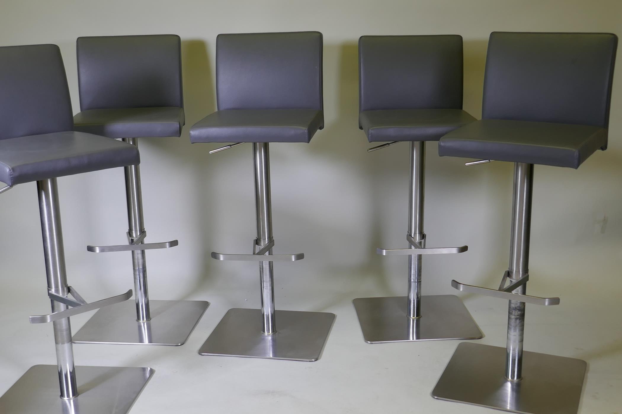 A set of five brushed steel swivel and height adjustable kitchen bar stools, 105cm extended - Image 2 of 3