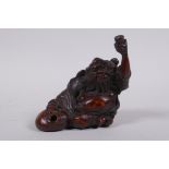 A Chinese carved bamboo root figure of a bearded seated sage, 10cm wide, 10cm high
