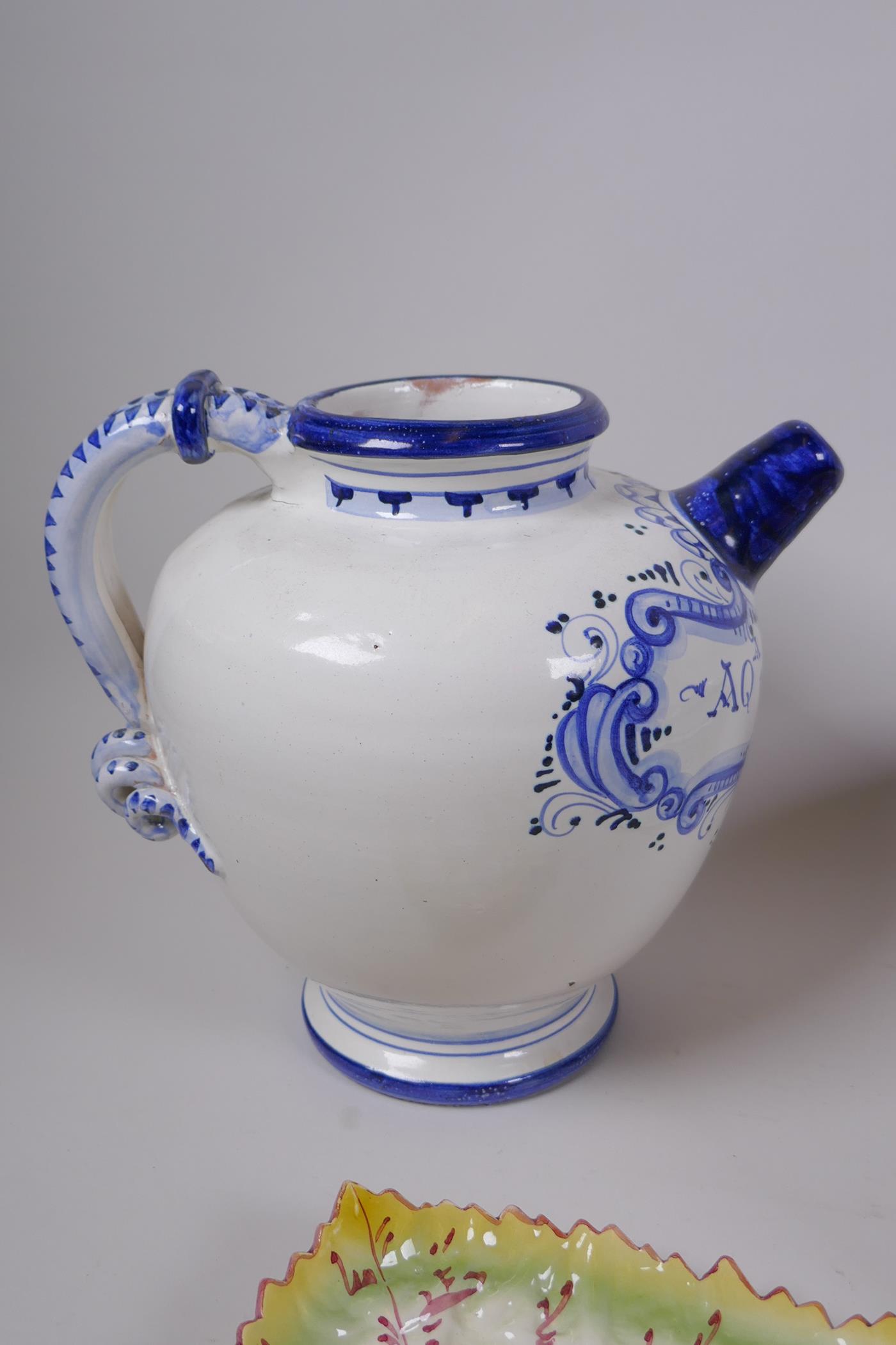 A collection of Italian majolica to include a bramble wine jug, leaf, shape dishes, a steep sided - Image 3 of 8