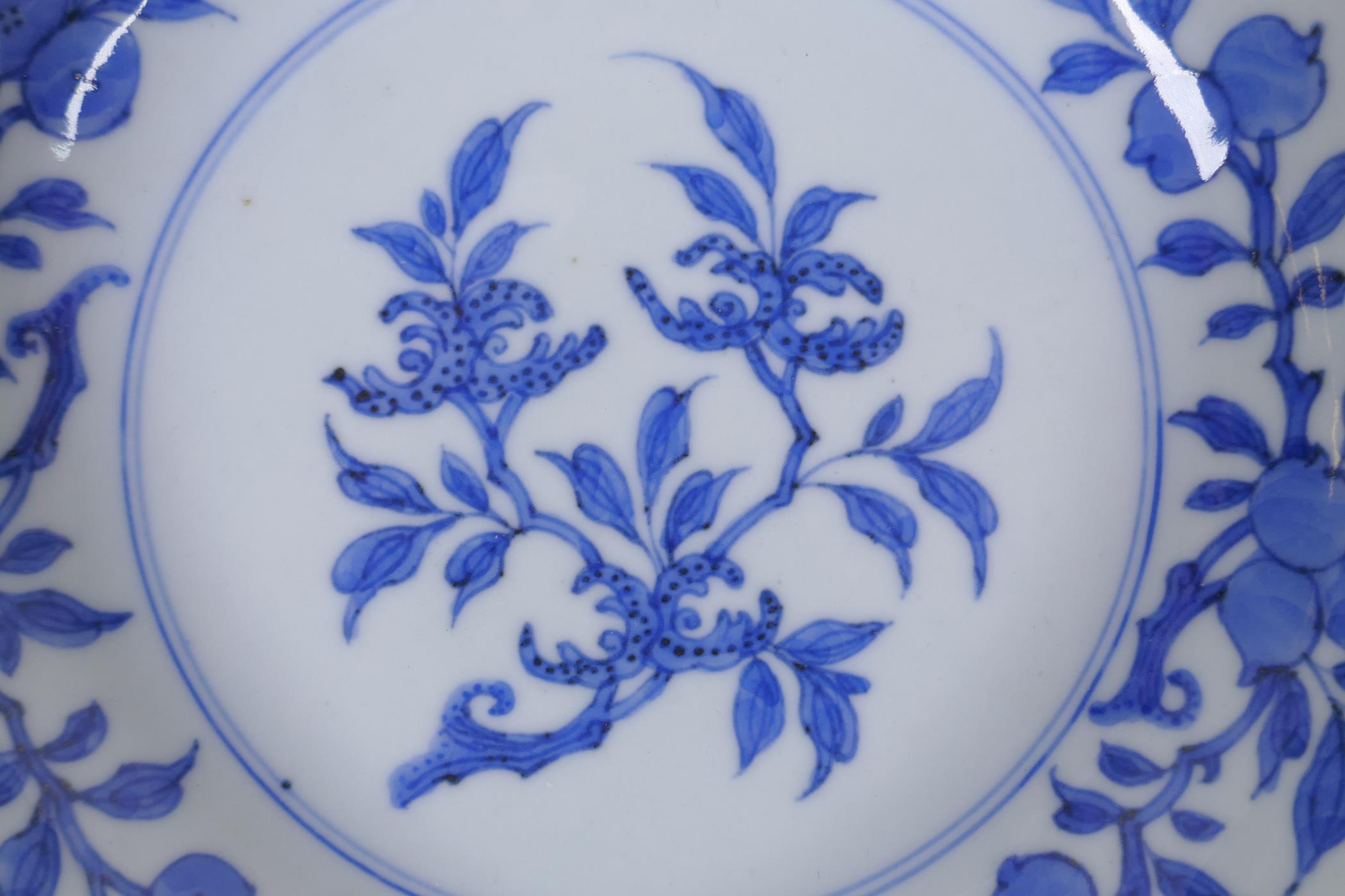 A C19th Chinese blue and white porcelain dish decorated with peaches, pomegranates and Buddha's hand - Image 2 of 5