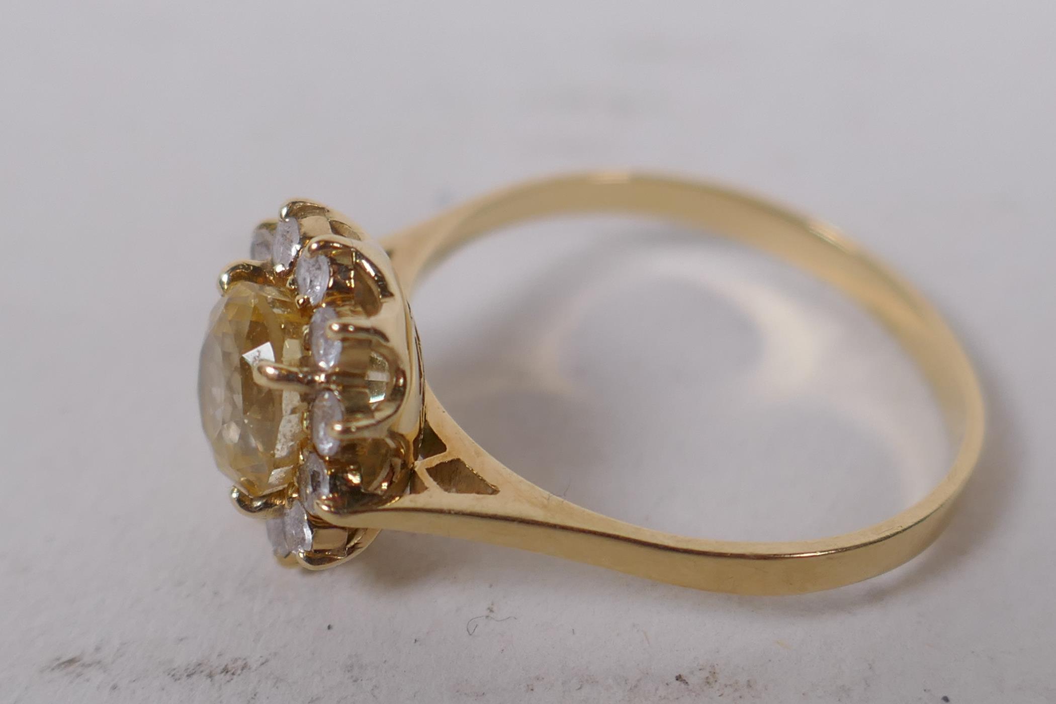 14ct gold ring set with central yellow sapphire surrounded by white sapphires, size N/O - Image 3 of 7