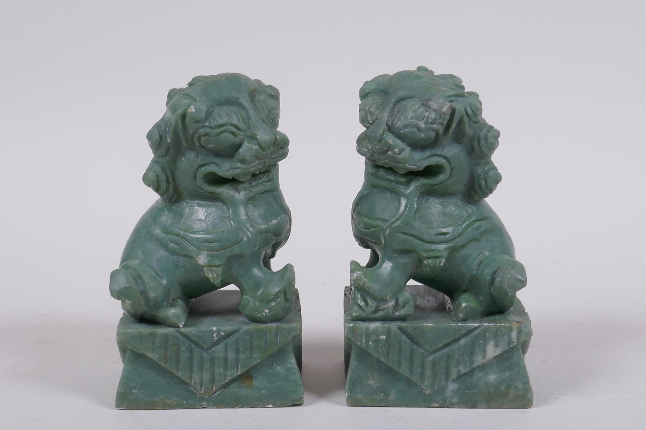 A pair of Chinese carved green soapstone temple lions, 10cm high - Image 2 of 6