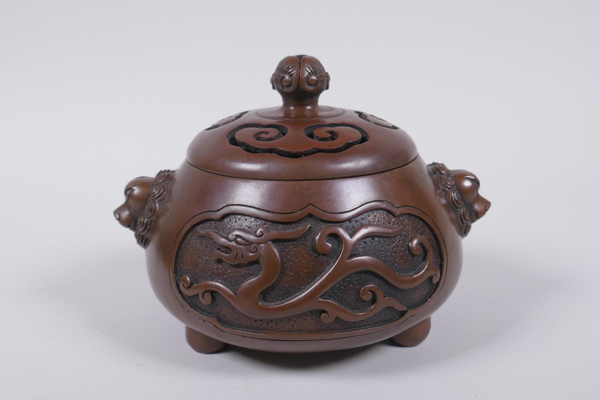 A Chinese bronze censer and cover with two lion mask handles and stylised decorative dragon - Image 3 of 6