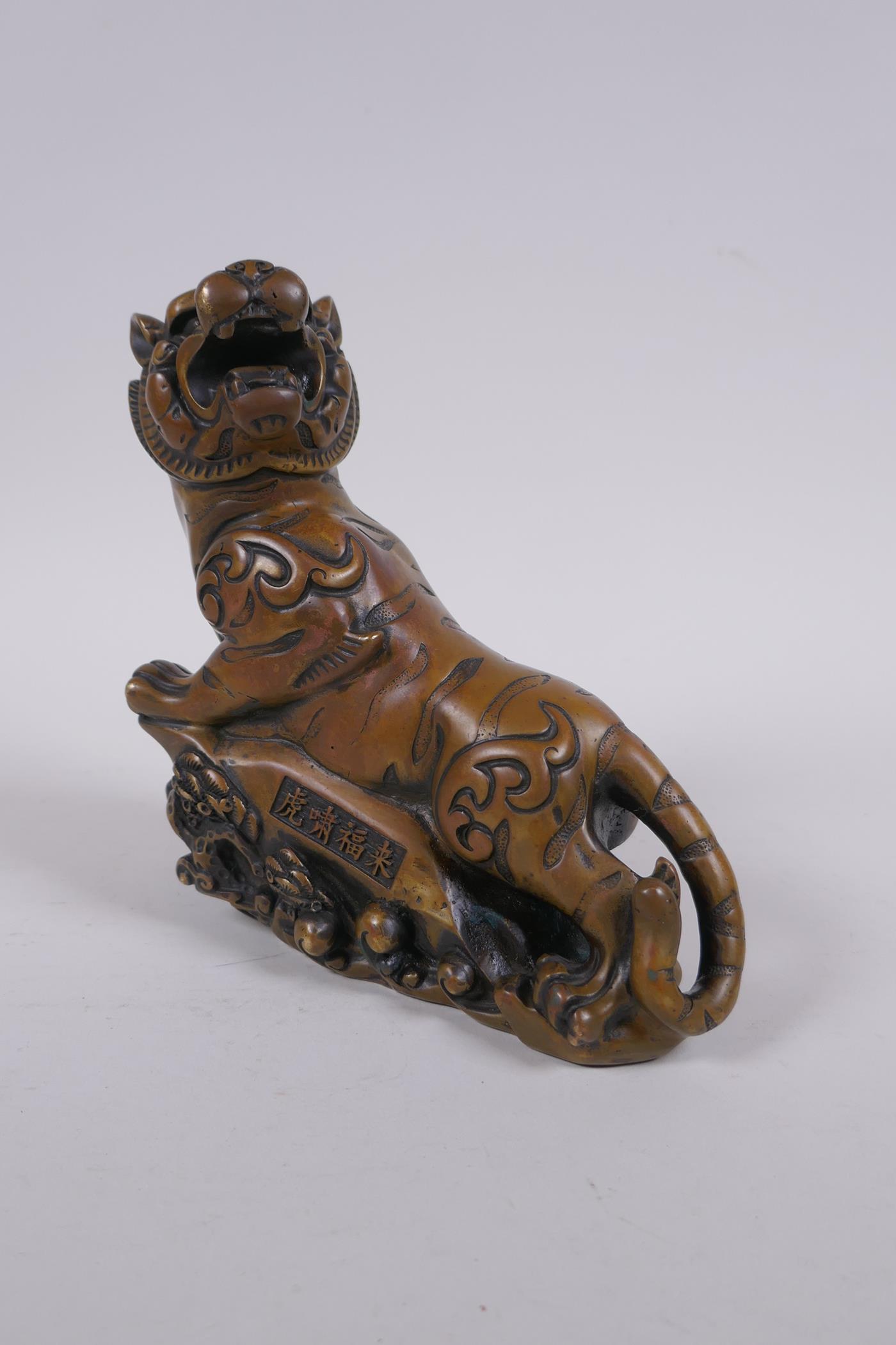 A Chinese bronze figure of a prowling tiger, 4 character inscription to side, impressed Xuande 6 - Image 4 of 7