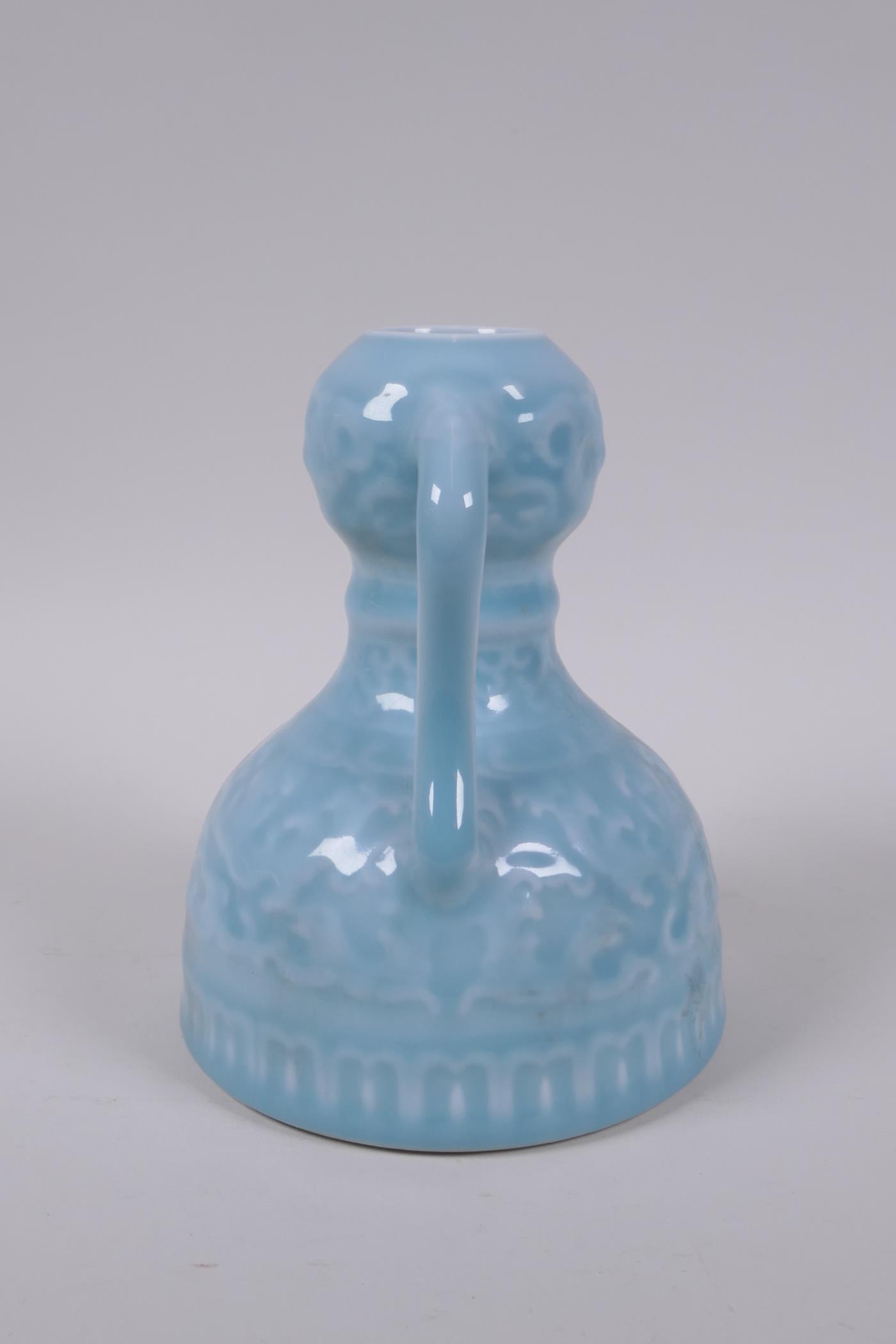 A celadon glazed porcelain two handled garlic head shaped vase with stylised under glaze dragon - Image 2 of 6