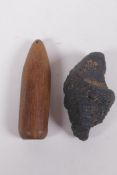 Two Agar wood shards, one drilled for a pendant, largest 7cm long