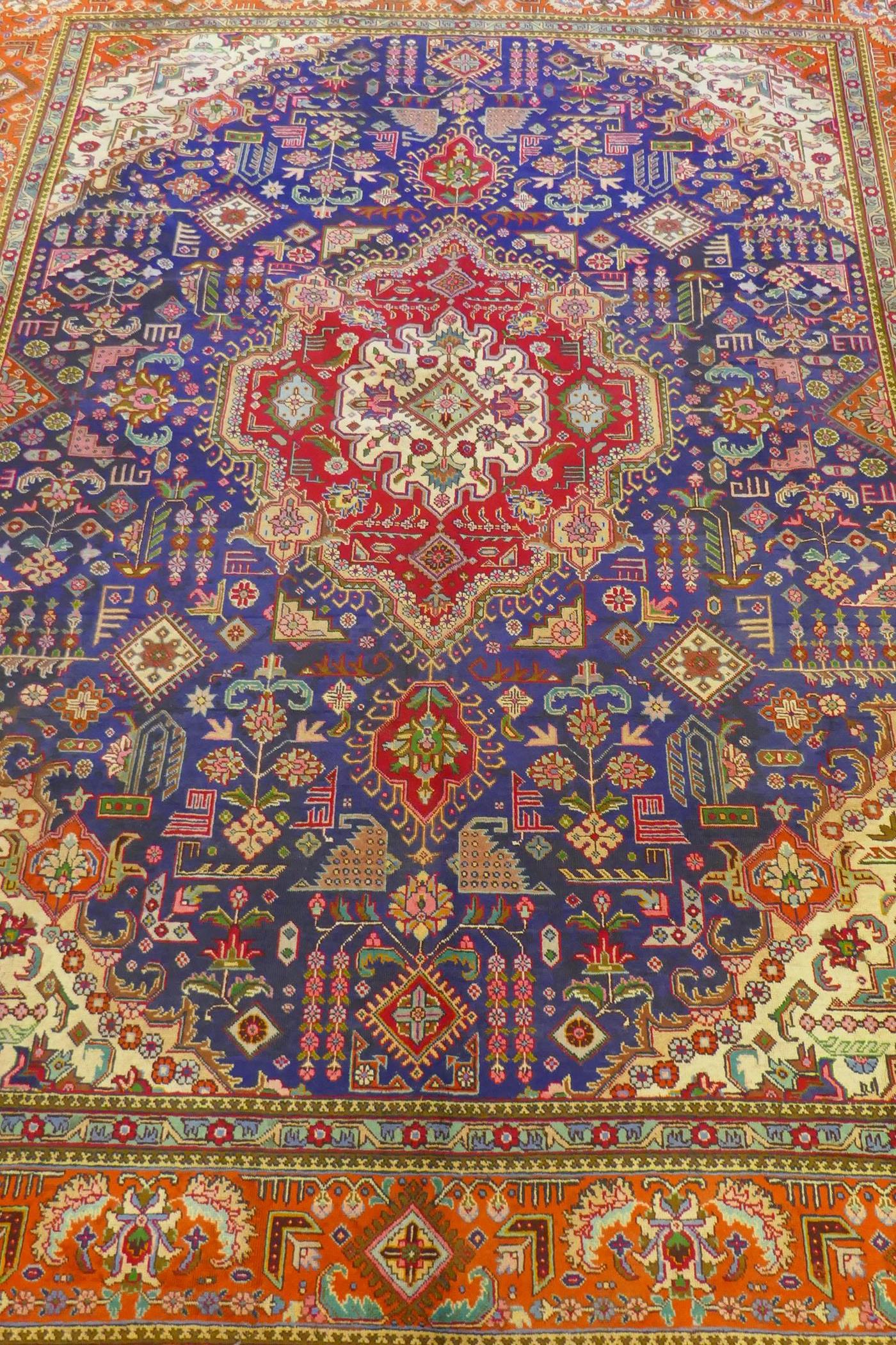 Large Persian carpet on a rich blue ground and multicolour field, with burnt orange border, - Image 2 of 6